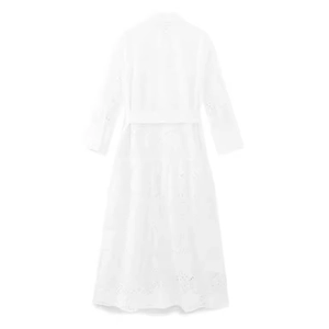 Elegant white long sleeve dress with intricate embroidery and hollow out detailing