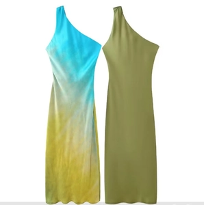 Detail view of one-shoulder slim fit dresses in gradient tie-dye and solid olive green satin