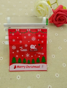 Self-sealing Christmas candy bag featuring Santa Claus sled and Merry Christmas print