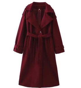 Detailed front view of a wine red long trench coat with lapels and belted waist