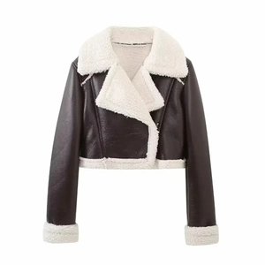Detailed view of women's short faux shearling biker jacket with plush lining and wide collar