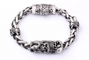 Gothic 316L stainless steel woven bracelet with skull and snake magnetic clasp design