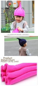 Close-up of soft knit kids elf hat featuring a unique pointed design in pink and navy