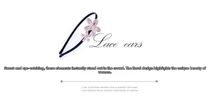 Detail of black headband with two rhinestone flower decorations and crystals