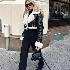 Cropped black faux leather motorcycle jacket with white fleece trim and collar