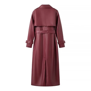 Women's long burgundy faux leather trench coat with waist belt and back vent detail