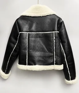 Rear view of cropped faux leather moto jacket with white faux fur trim and collar