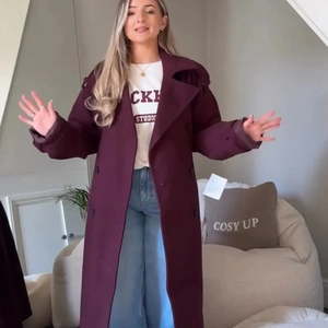 Elegant wine red long lapel coat for women with classic double-breasted buttons