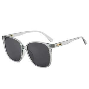 Retro oversized square frame sunglasses with transparent grey finish and striped detail