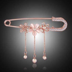 Elegant rose gold flower brooch with pink opal cat eye stone and crystal chain tassels