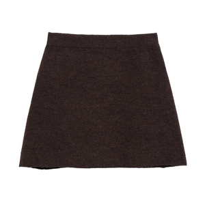Detailed view of dark brown knitted A-line skirt with soft wool texture and elastic waist