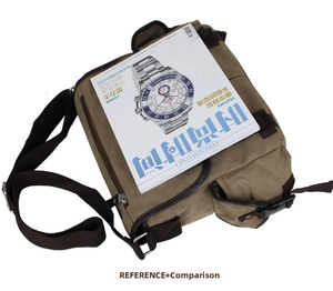 Top view of khaki canvas messenger bag next to a magazine showing dimensions and details