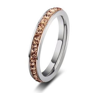 Polished stainless steel eternity ring with champagne zircons in a channel setting