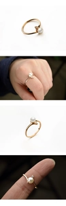 Macro view of G925 hallmark on a gold-plated sterling silver pearl ring band