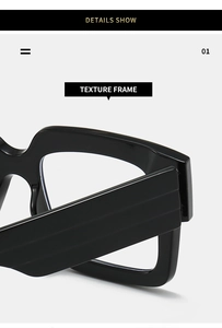 Detailed macro view of the glossy black thick frame and durable texture hinges