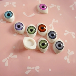 Macro shot of colorful 12x16MM acrylic doll eyes with realistic iris patterns and hollow back