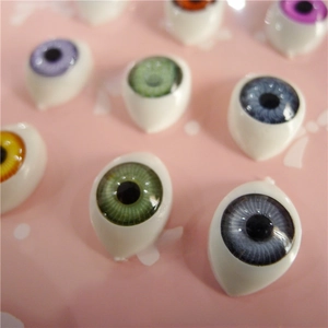 Detailed macro view of 12x16mm colorful acrylic boat-shaped doll eyes for BJD dolls