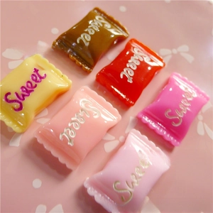 Macro detail of sweet candy resin charms in six colors for DIY hair and shoe crafts