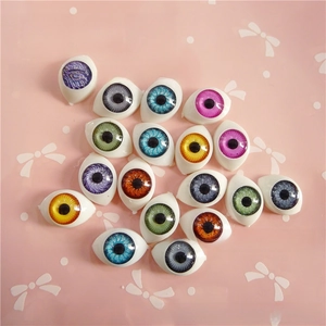 Detailed pile of 12x16mm colorful acrylic doll eyes with realistic radial iris textures