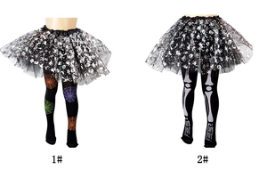 Detail of Halloween kids tutu skirt and patterned leggings with skeleton and spider web prints
