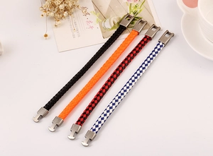 Detailed view of woven leather bracelets with vintage silver T-bar clasp in various colors