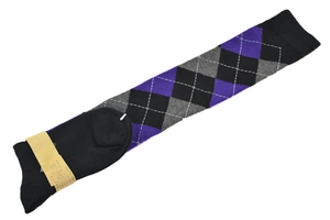 Detail of argyle pattern socks in purple and black with cotton blend texture