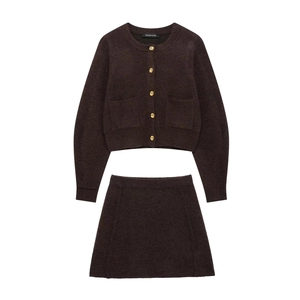 Flat lay of brown knit two-piece set with round neck cardigan and mini skirt