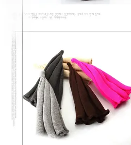Detail of ribbed knit pointed wizard hats for children in various neutral color options