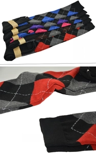 Detail of argyle pattern over-the-knee socks showing the non-slip ribbed cuff in five colors