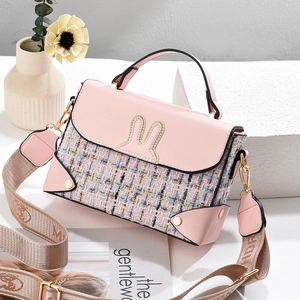 Pink tweed crossbody bag with cartoon rabbit ears and wide embroidered shoulder strap