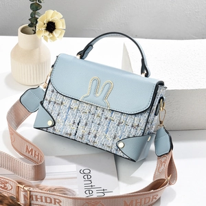 Fresh light blue crossbody bag with tweed texture and rabbit ear design for women