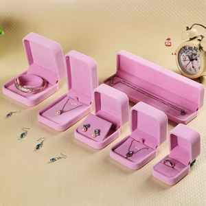 Pink velvet jewelry gift boxes collection including ring, pendant and bracelet cases