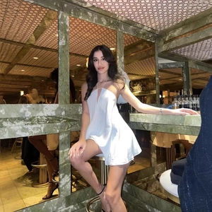 Elegant white satin halter neck mini dress for parties with sleek A-line silhouette