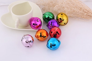 Close-up of colorful metal star cutout bells for DIY crafts and holiday decor