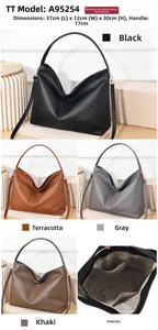 Detail view showing internal zipper pocket and large capacity of the lychee leather tote bag