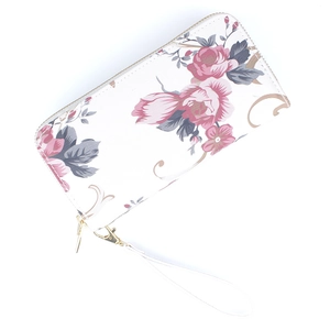 Detailed close-up of vertical floral wallet with red rose print and gold metal zipper