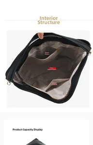 Detailed interior of black pebbled leather bucket bag with main compartment and zipper pocket