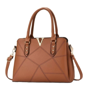 Brown lychee leather tote bag with gold V logo and geometric stitching patterns