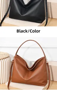Close-up of litchi texture leather bucket bags in black and brown finishes