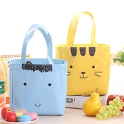 Detail of cute cartoon canvas lunch bags with wide handles and durable linen fabric