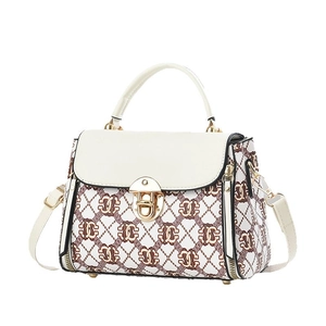 Women's plaid crossbody bag with ivory flap, gold clasp and top handle on white background