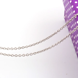 Sleek 316L stainless steel chain necklace with circular link design on white background