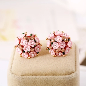 Elegant rose flower stud earrings with pink petals, gold beads and sparkling crystals