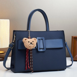 Three-piece large capacity navy handbag with herringbone texture and cute bear charm