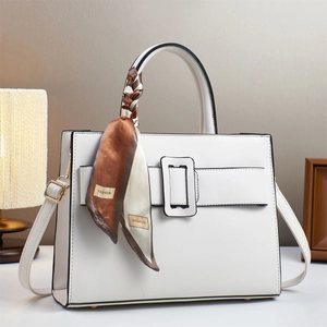 White faux leather tote bag with printed silk scarf and adjustable shoulder strap