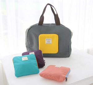 Foldable travel bag with luggage sleeve showing compact folded and expanded large capacity