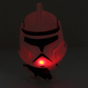 Close-up of Star Wars Clone Trooper LED night light glowing in a vibrant red hue
