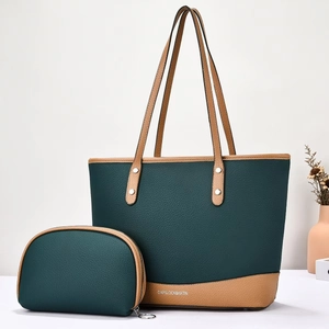 Green and khaki litchi leather tote bag set with matching pouch on a minimalist background