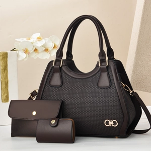 Detail of coffee brown three-piece handbag set featuring woven texture and gold metal logo