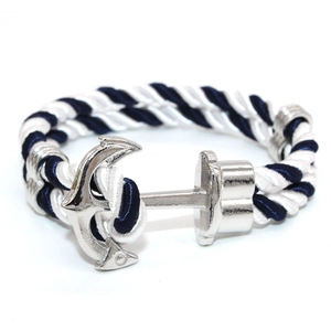 Close-up of anchor clasp detail on blue and white nautical woven cord bracelet